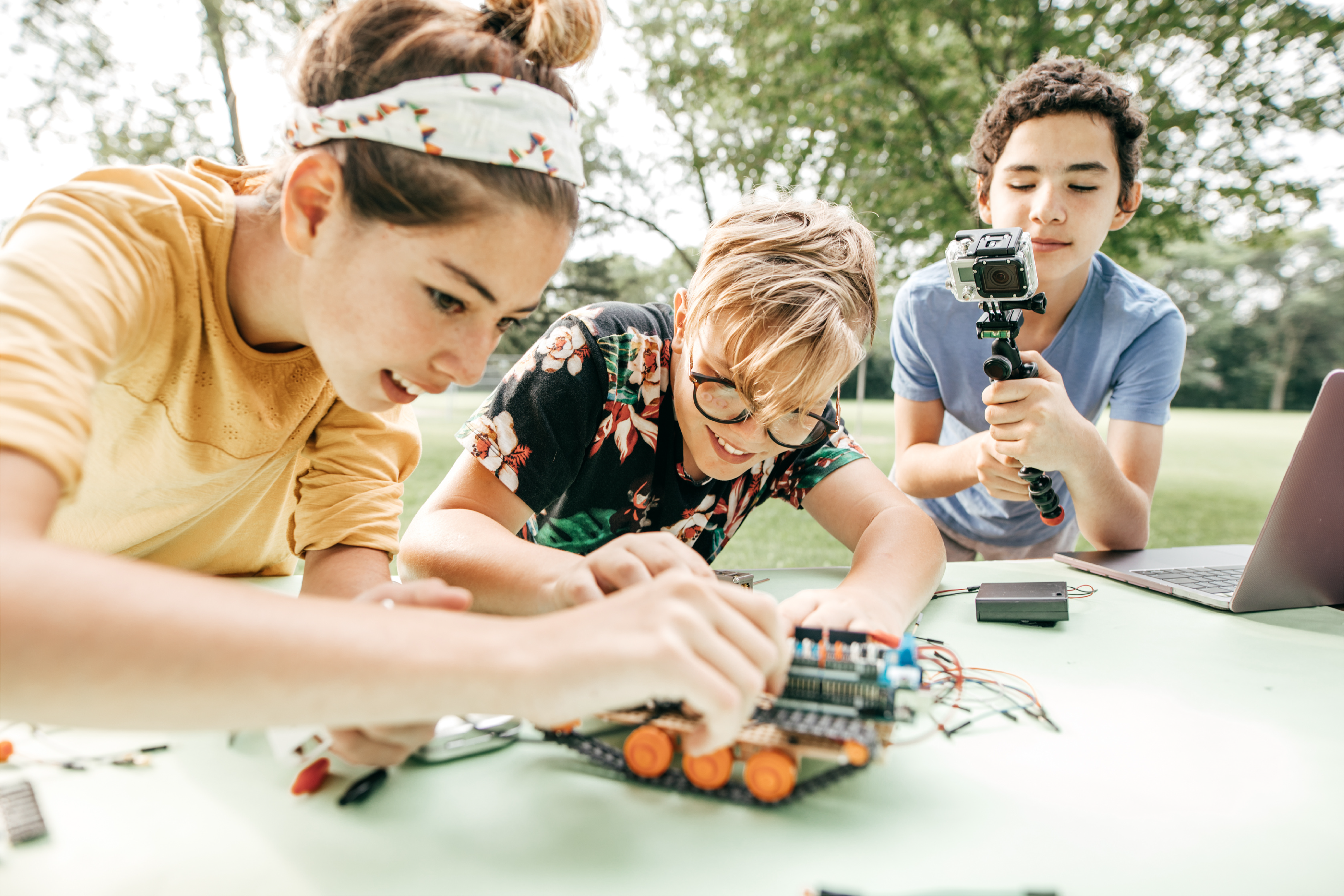 Youth creating robotics at camp